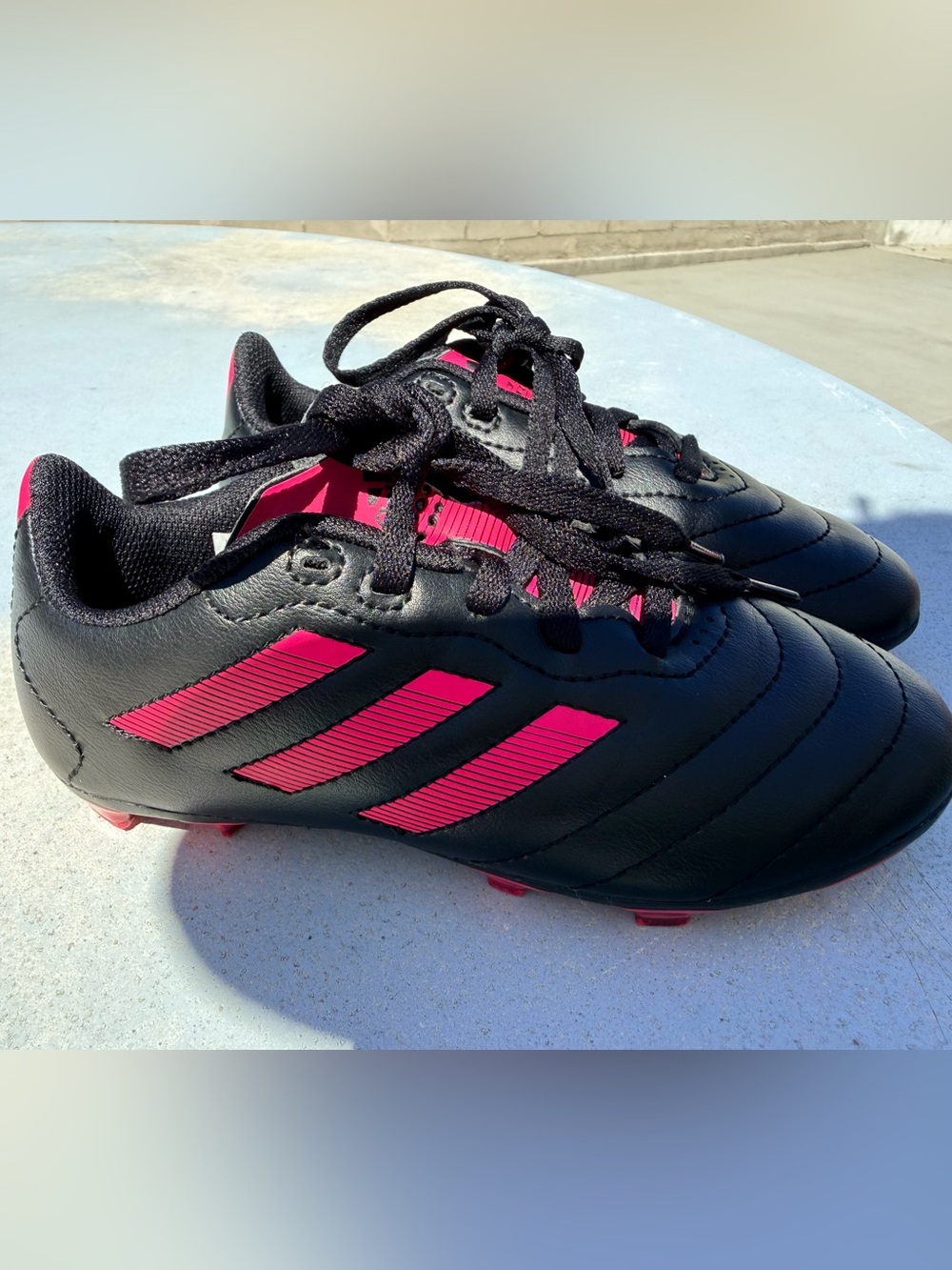 Like new Black & Pink Soccer Cleats size 13
